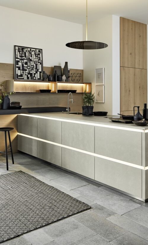 A light, modern nolte kitchen, comprised of popular ranges Portland (grey cement) and Tavola (oak)